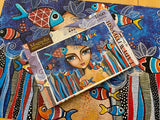 Lady with Fish - Magnolia Puzzle