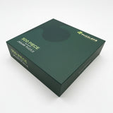 A dark green rectangular box for a 500-piece jigsaw puzzle, photographed at an angle on a clean white background. The box features gold text reading '500 PIECE JIGSAW PUZZLE' and a gold 'PUZZLERS' logo.